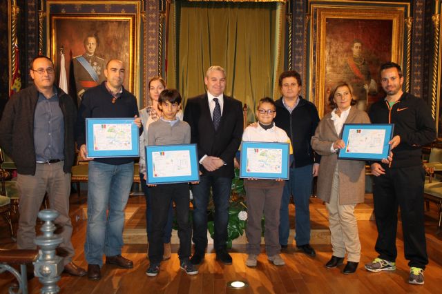 Dos escolares premiados por sus dibujos sobre el uso inteligente del agua